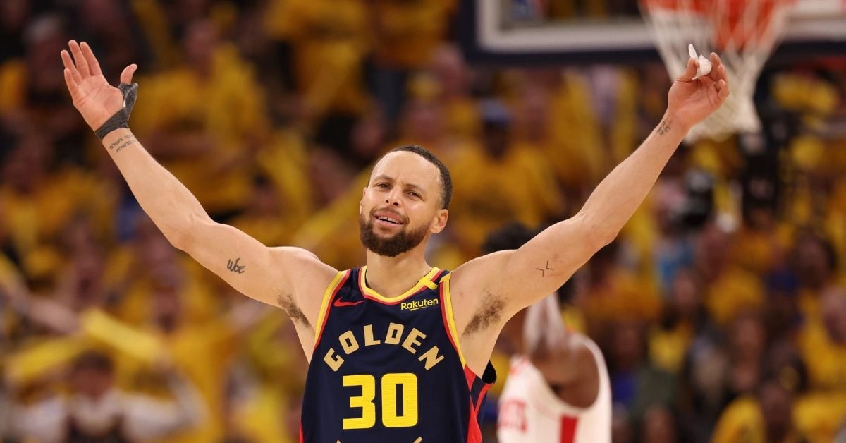 Golden State Warriors guard Stephen Curry reacts after a play
